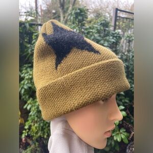 Women Star Beanie - Olive and Black.
NWT 
MSRP $79